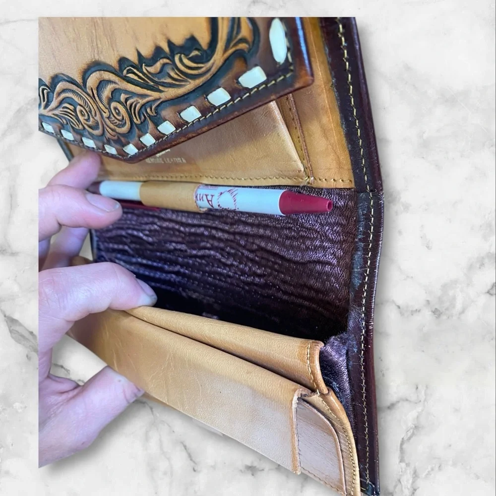 Leather billfold with check and pen spot